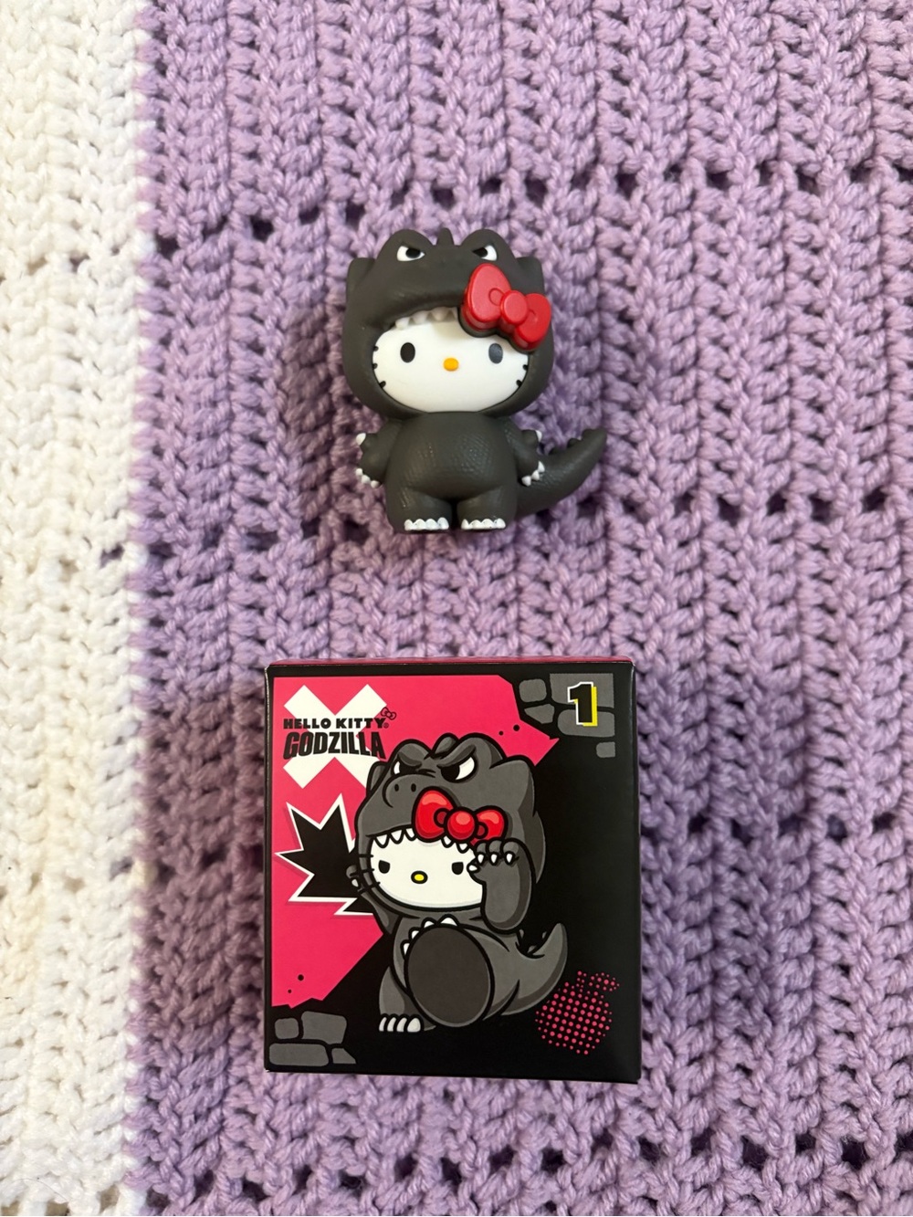 McDonald’s Hello Kitty Godzilla Figure in Black with Red Bow